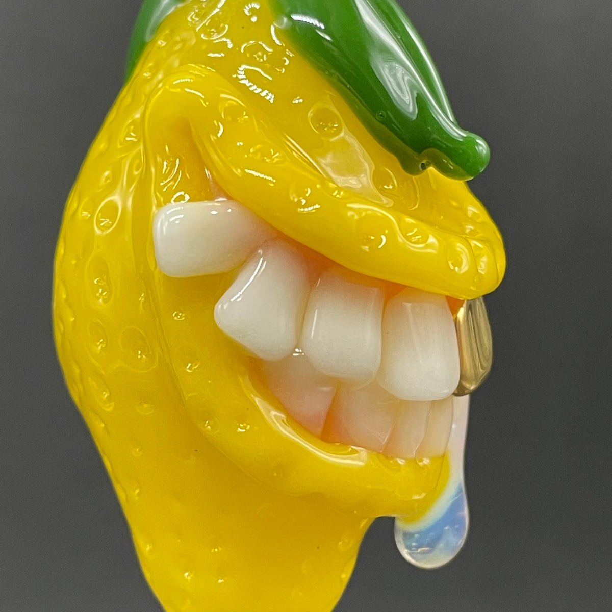 Grinning lemon pendant