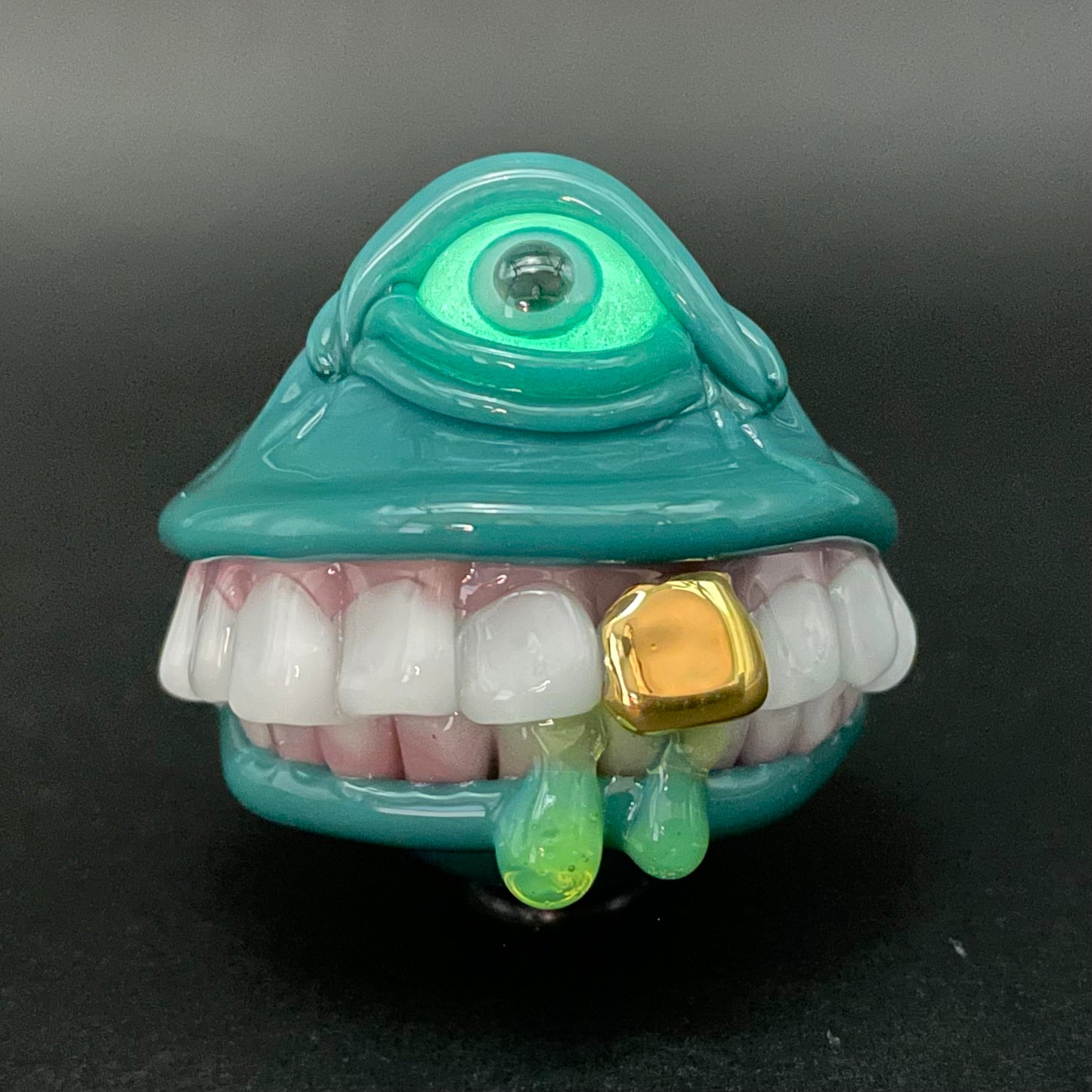 Grinning like a fool glass pendant