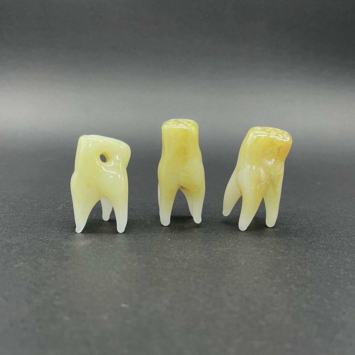 Hand-blown glass 3 glass tooth beads by Leviathan Glass