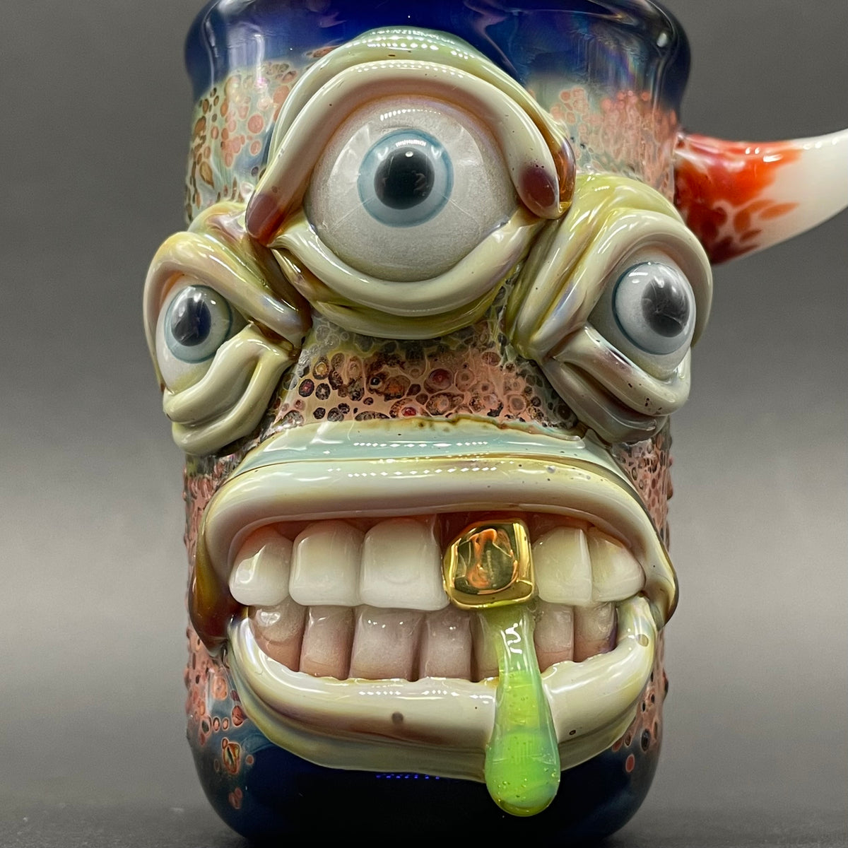 Close-up of Triclops shot glass - handcrafted glass