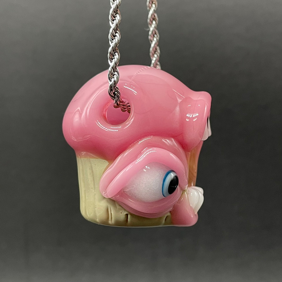 Close-up of Cupcake pendant - handcrafted glass