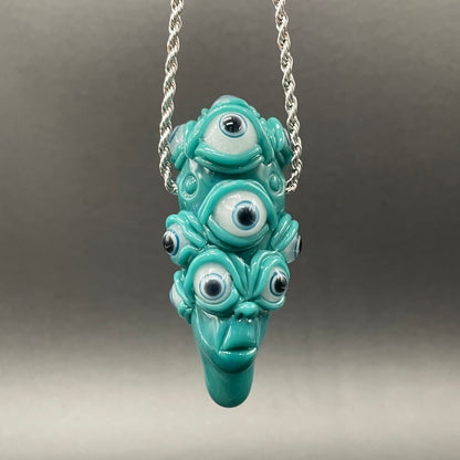 The Never-Blinking One glass effigy pendant detail view - premium glass art