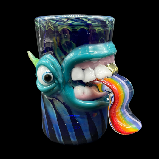 Hand-blown glass Hand blown kool AID tongue shot glass with gold tooth by Leviathan Glass
