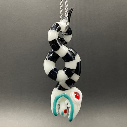 Close-up of Beetlejuice Inspired solid glass Sandworm  Sculpture - handcrafted glass