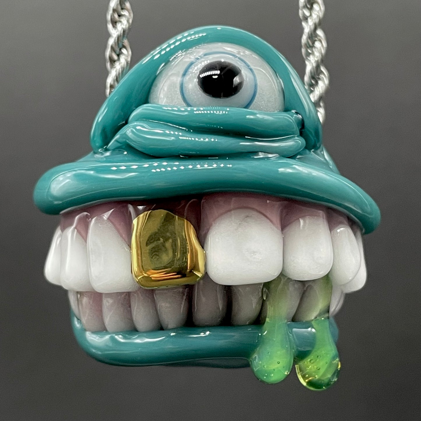 Grinning like a fool glass pendant