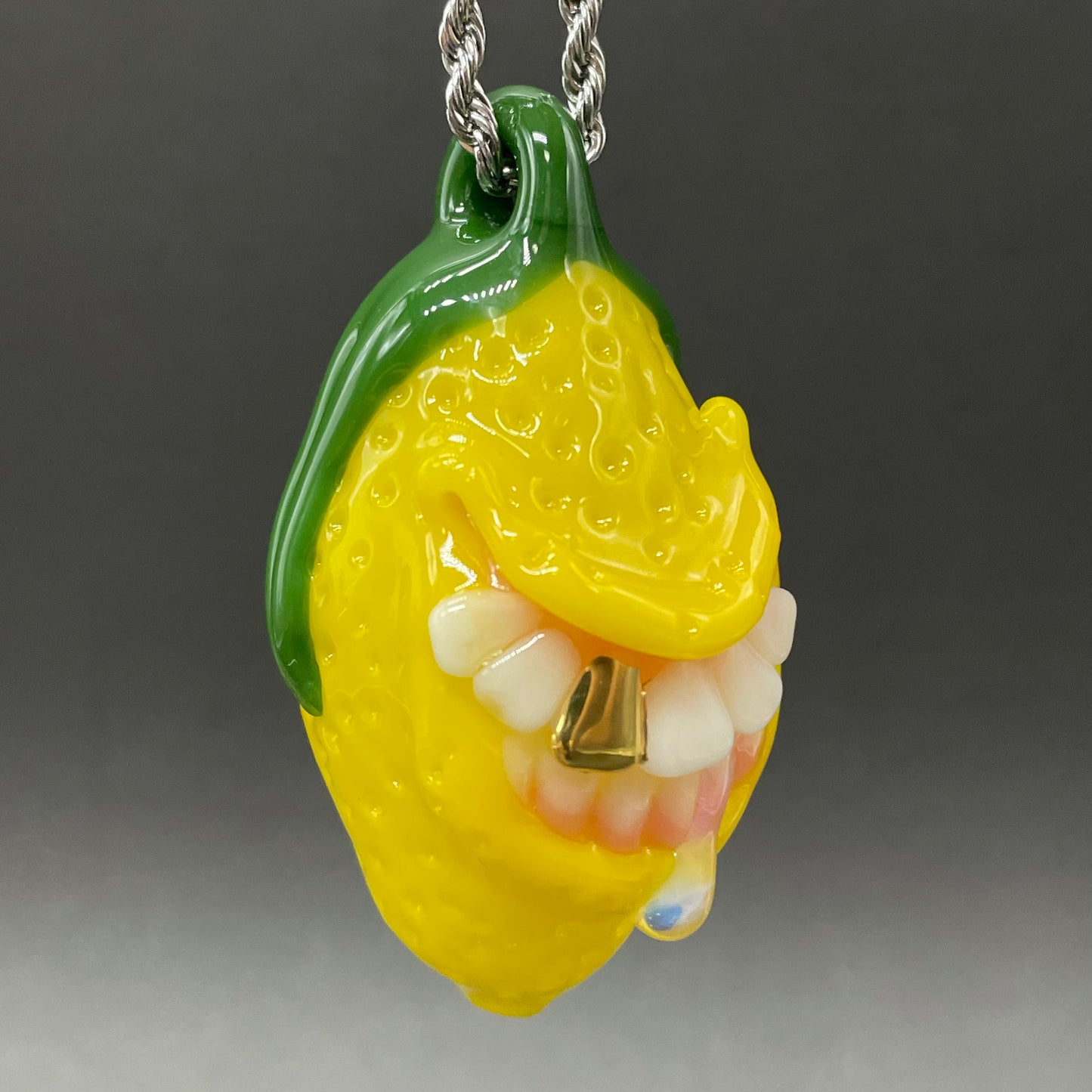 Grinning lemon pendant