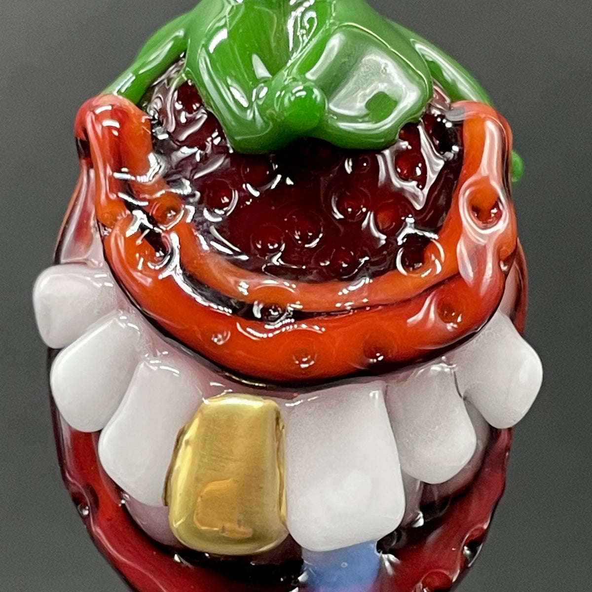 Toothy strawberry pendant craftsmanship - artisan glass work