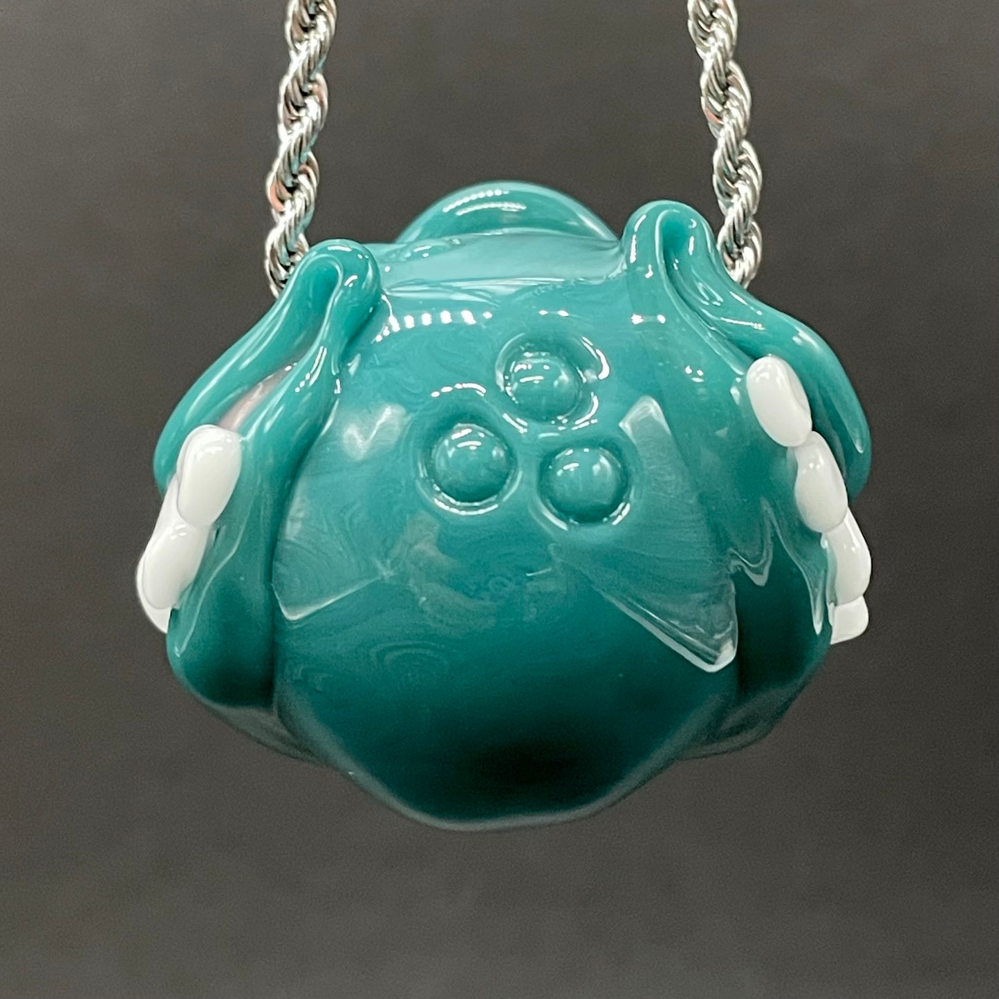 Grinning like a fool glass pendant