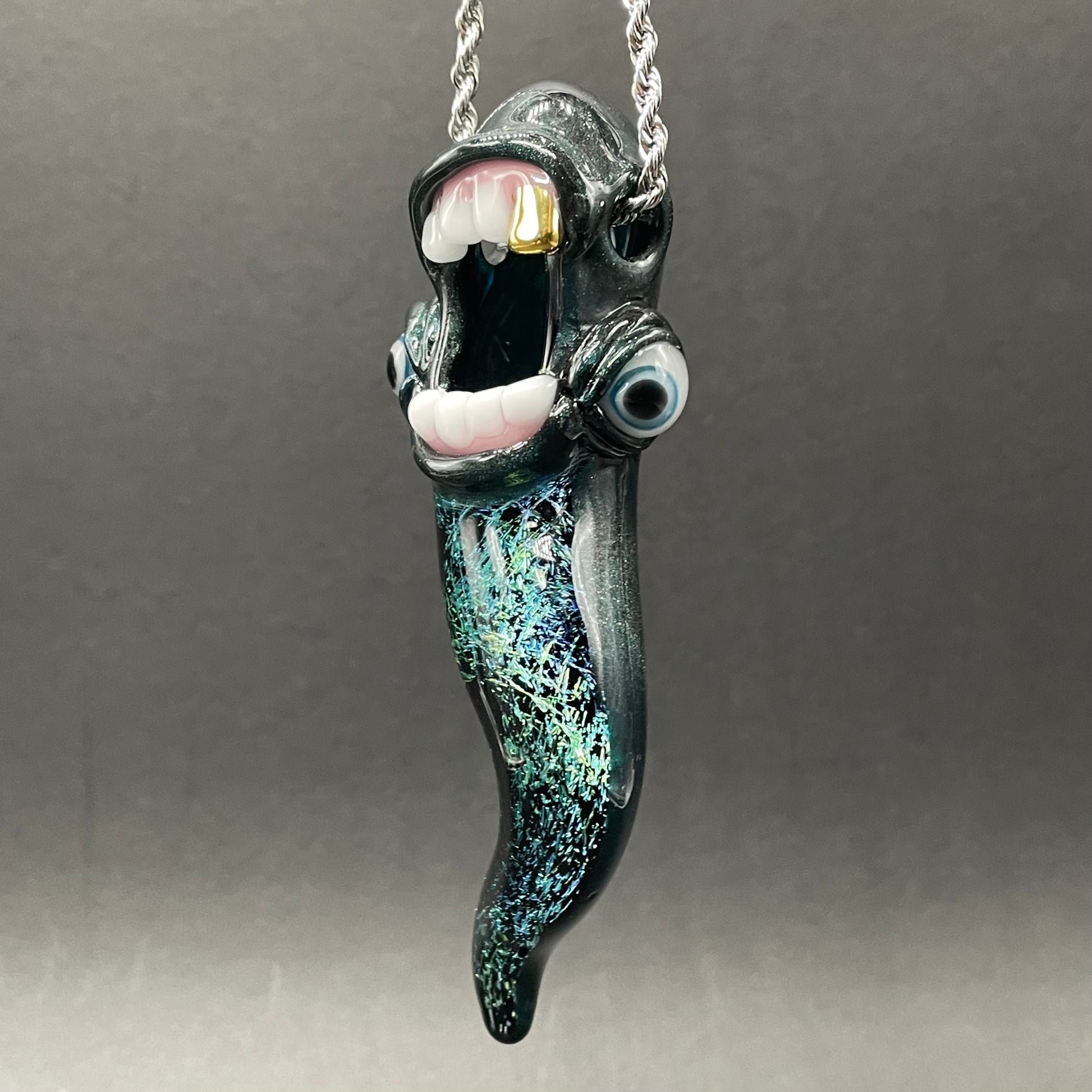 Close-up of Dichroic tentacle pendant - handcrafted glass