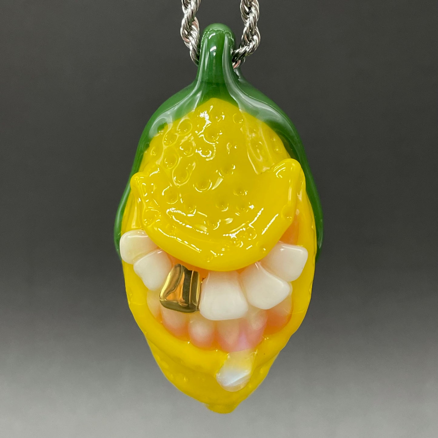 Grinning lemon pendant
