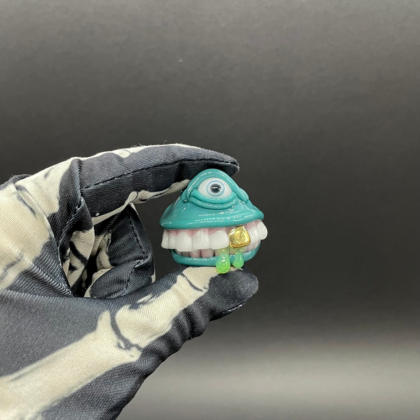 Grinning like a fool glass pendant