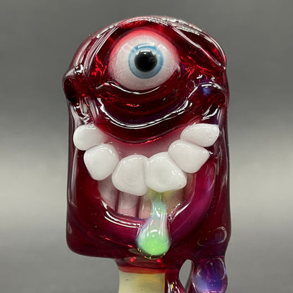 Close-up of Drippy popsicle pendant - handcrafted glass