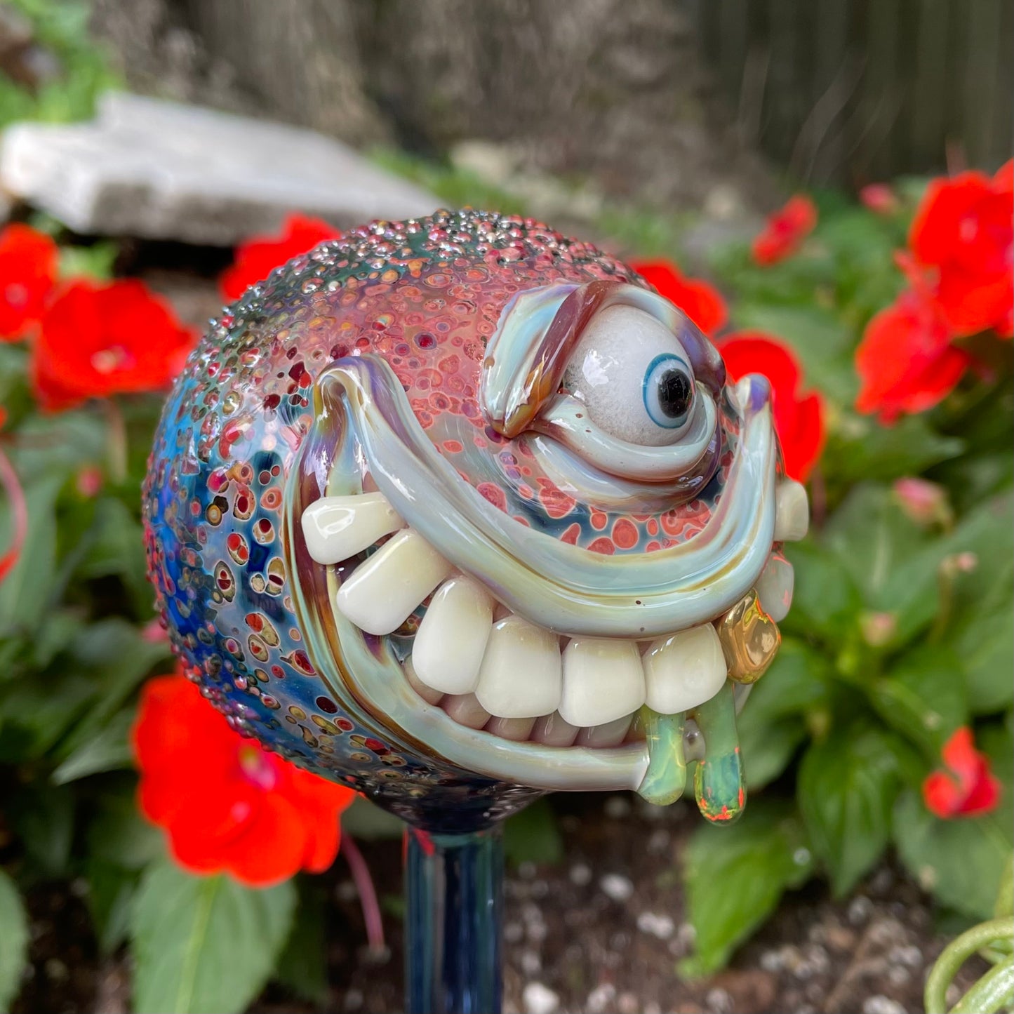Hand blown glass monster watering globe
