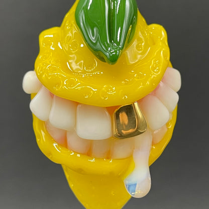 Grinning lemon pendant
