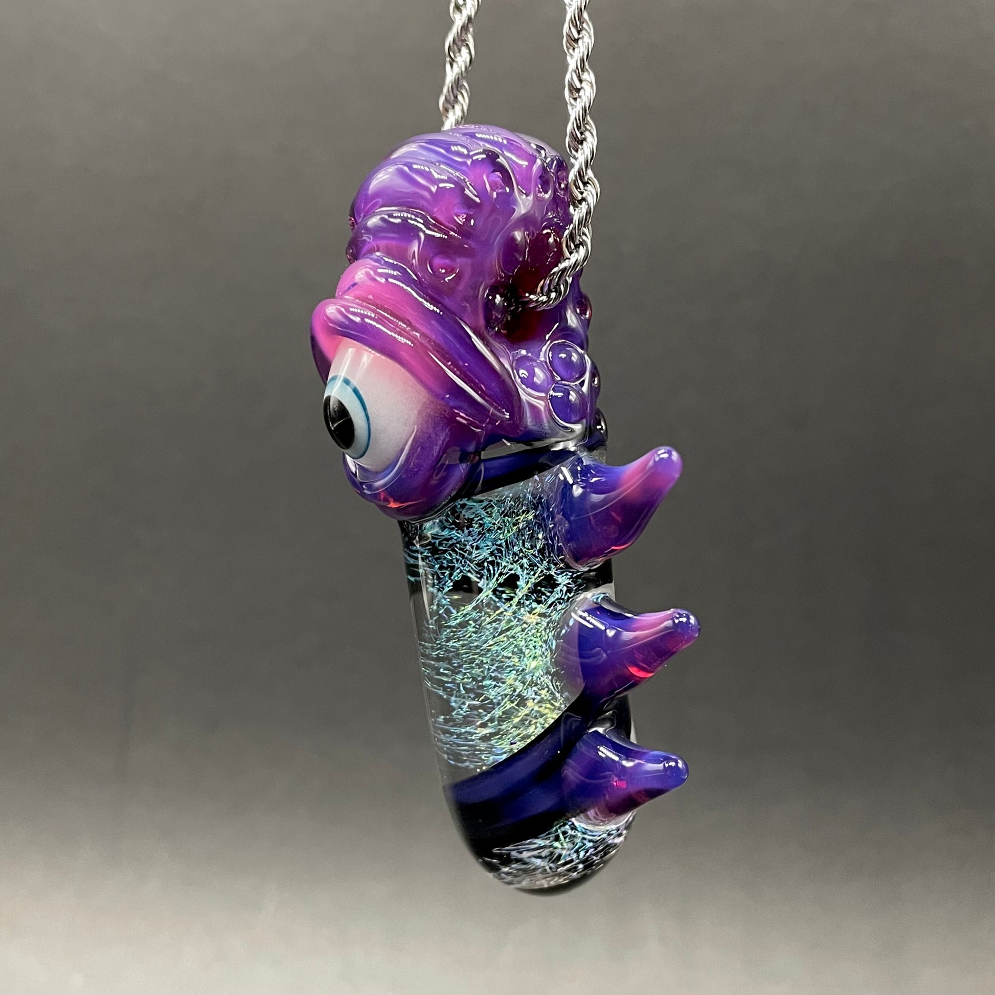 Royal jelly dichroic cyclops pendant detail view - premium glass art