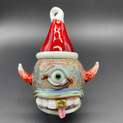 Santa hat cyclops ornament detail view - premium glass art