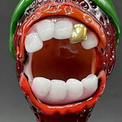 Screaming strawberry glass pendant by Leviathan Glass - artisan detail