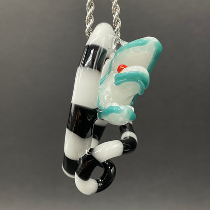 Beetlejuice Inspired handblown solid glass Sandworm sculpture - coiled black and white striped sandworm with white worm head, teal tongue, red eyes - Leviathan Glass