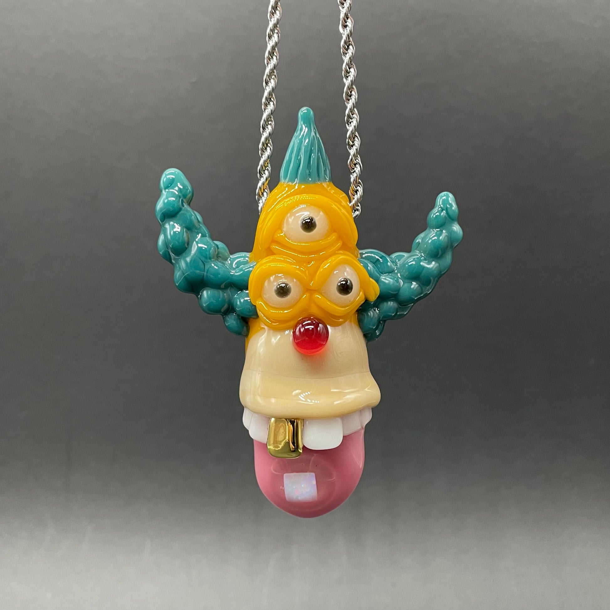 Hand-blown glass Krusty the clown glass pendant with opal tab by Leviathan Glass