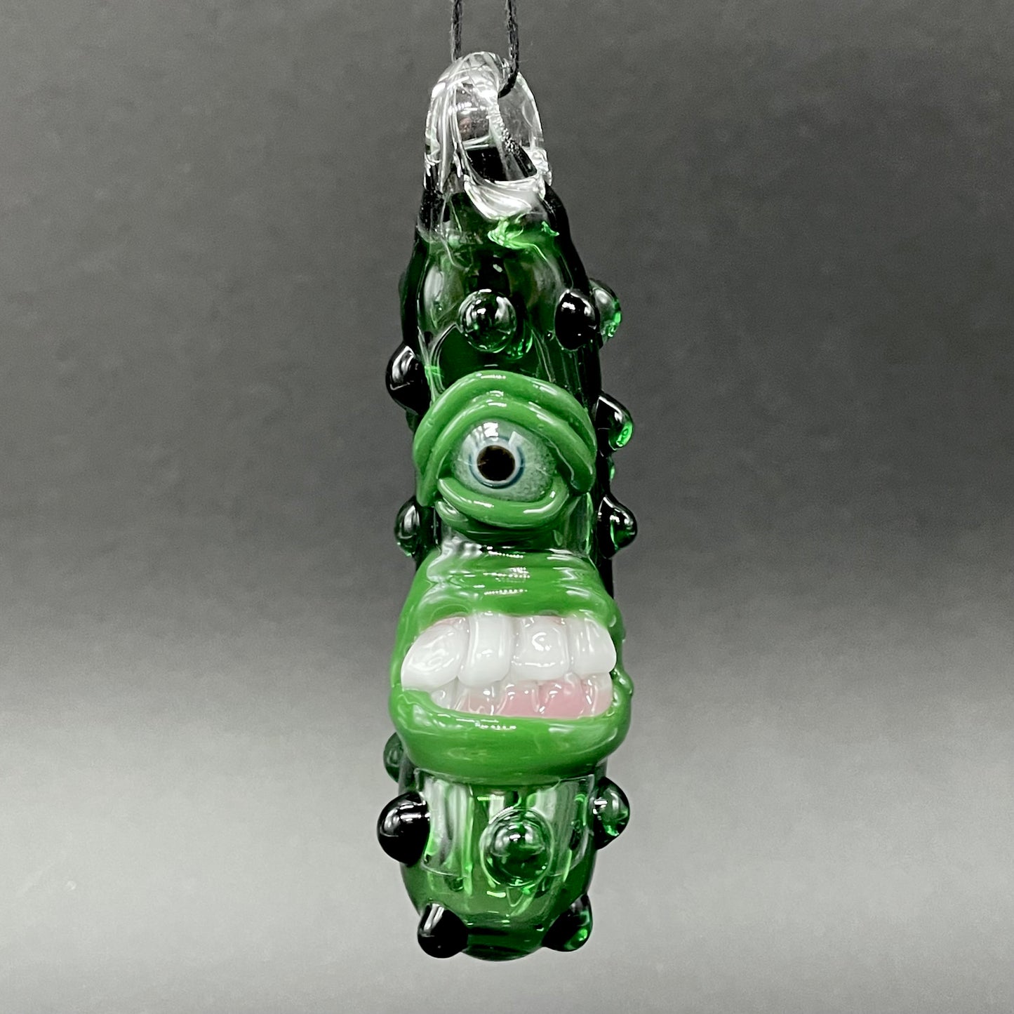 Close-up of Pickle Rick - handcrafted glass