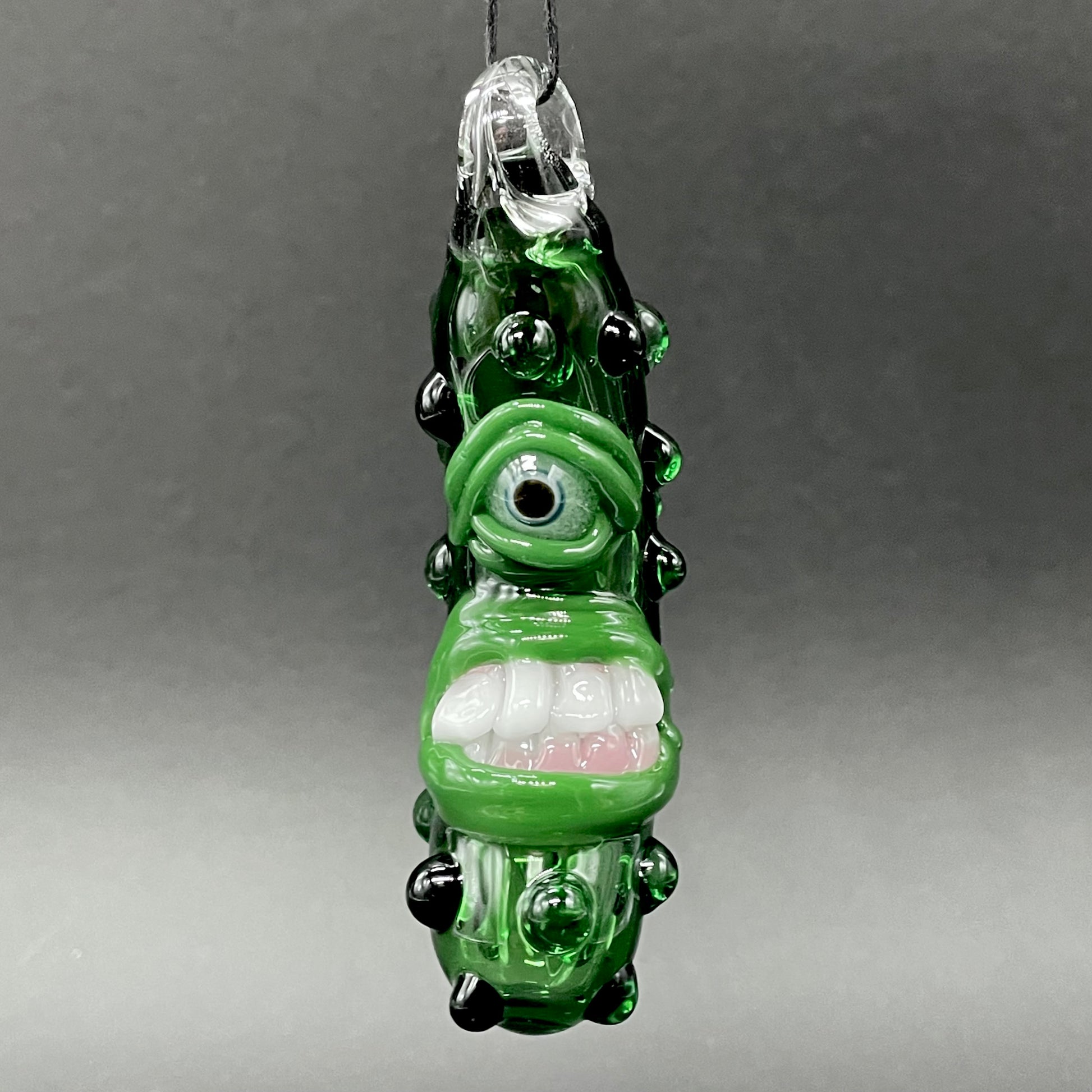 Close-up of Pickle Rick - handcrafted glass