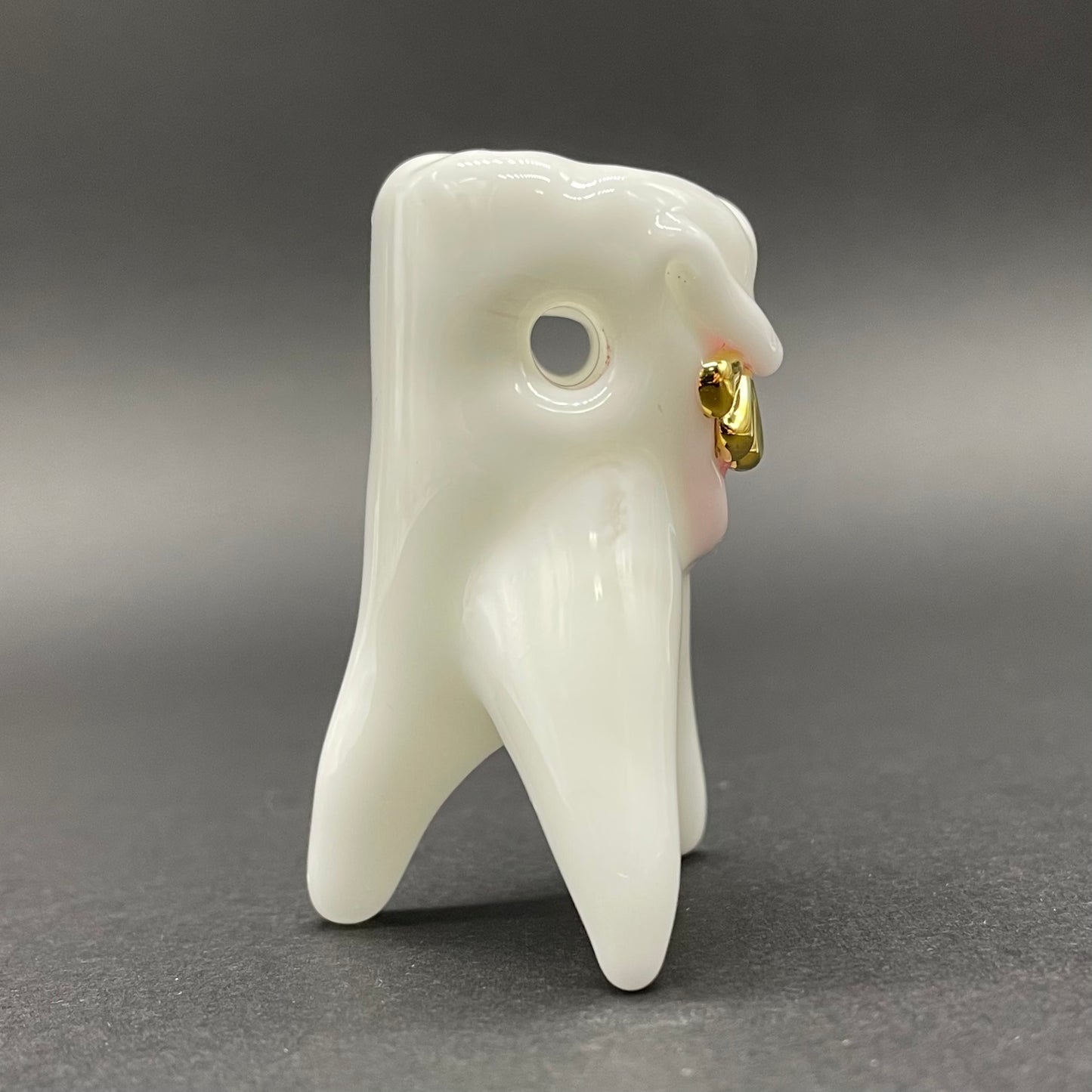 Tooth ache glass pendant by Leviathan Glass - artisan detail