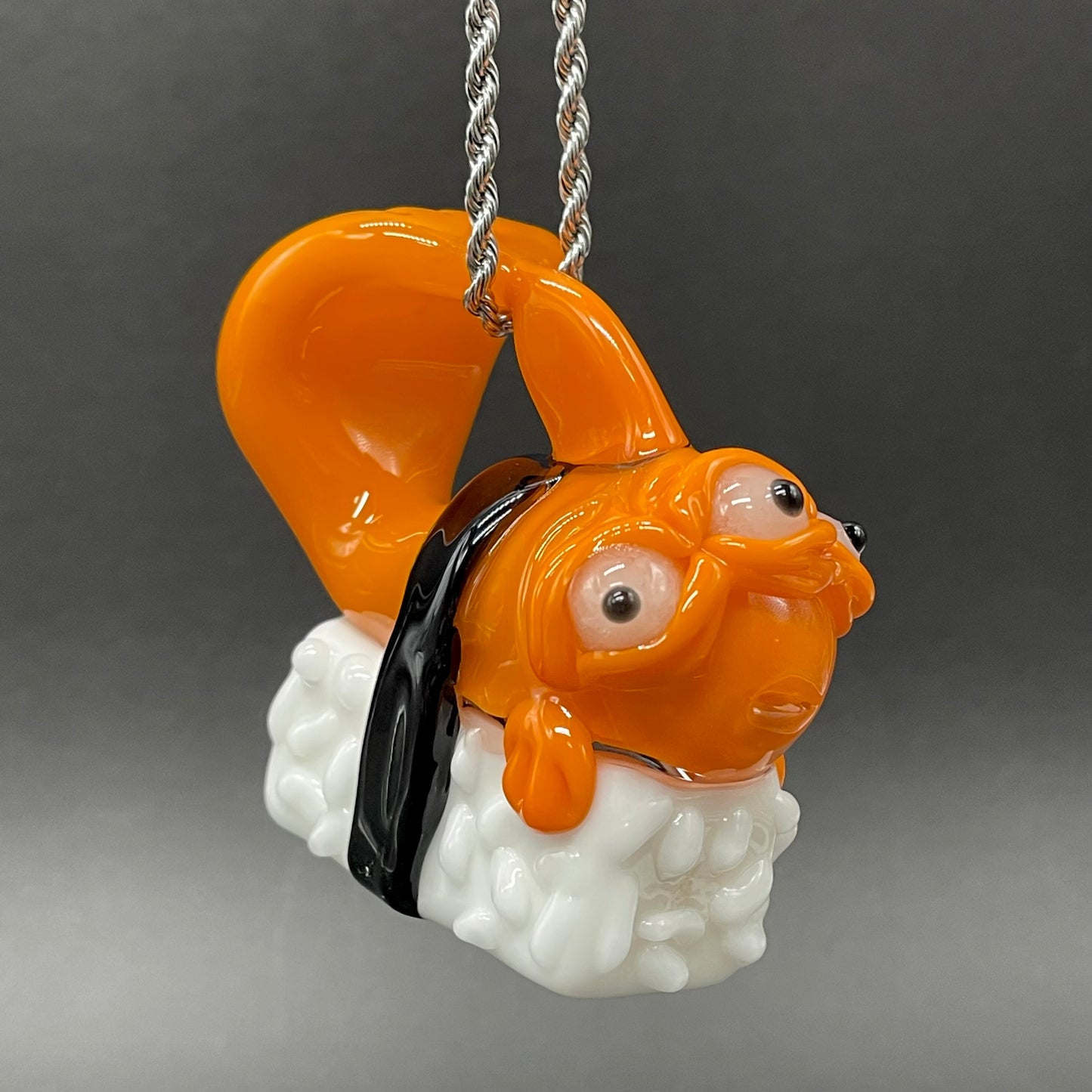Mutant three eyed fish sushi glass pendant