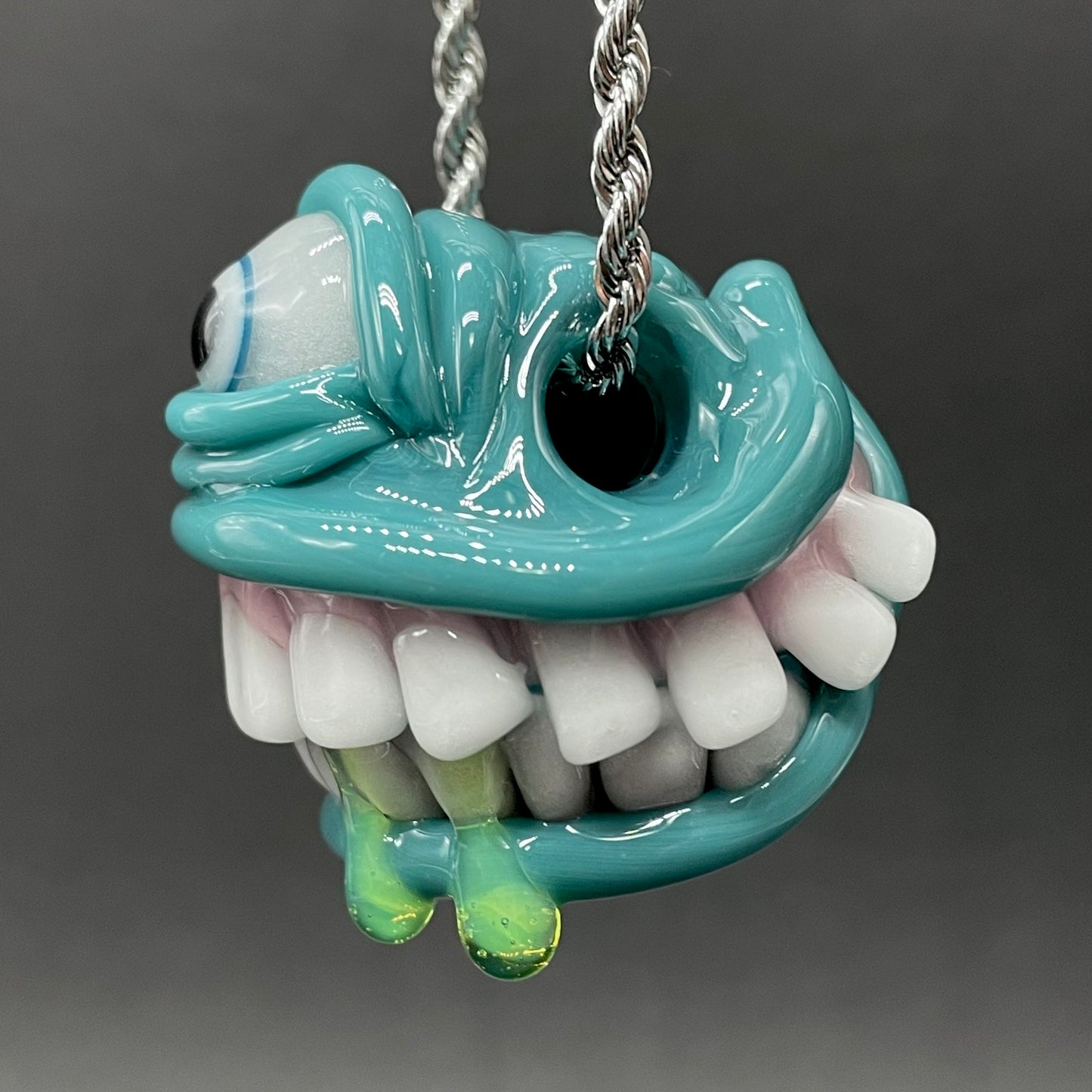 Grinning like a fool glass pendant