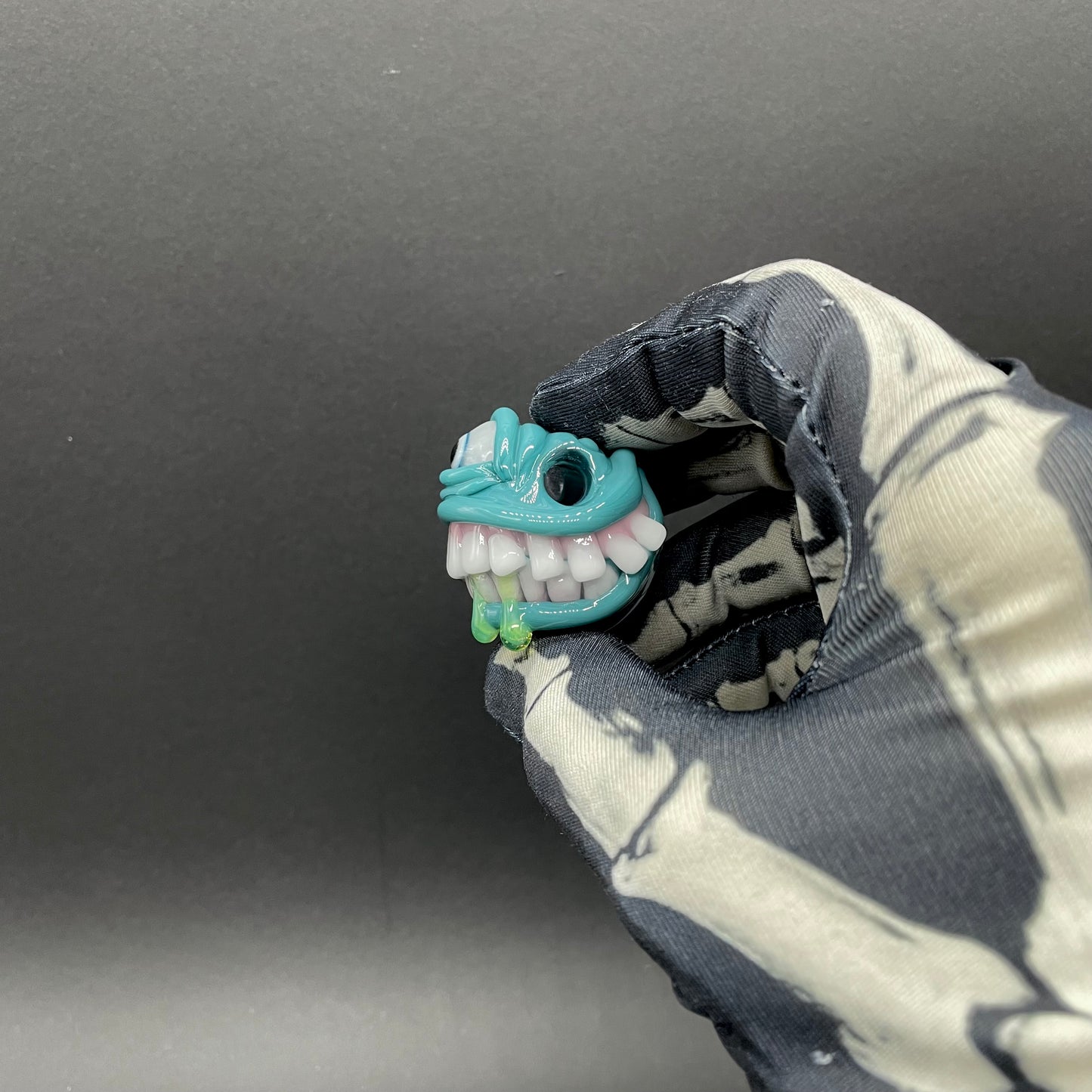 Grinning like a fool glass pendant