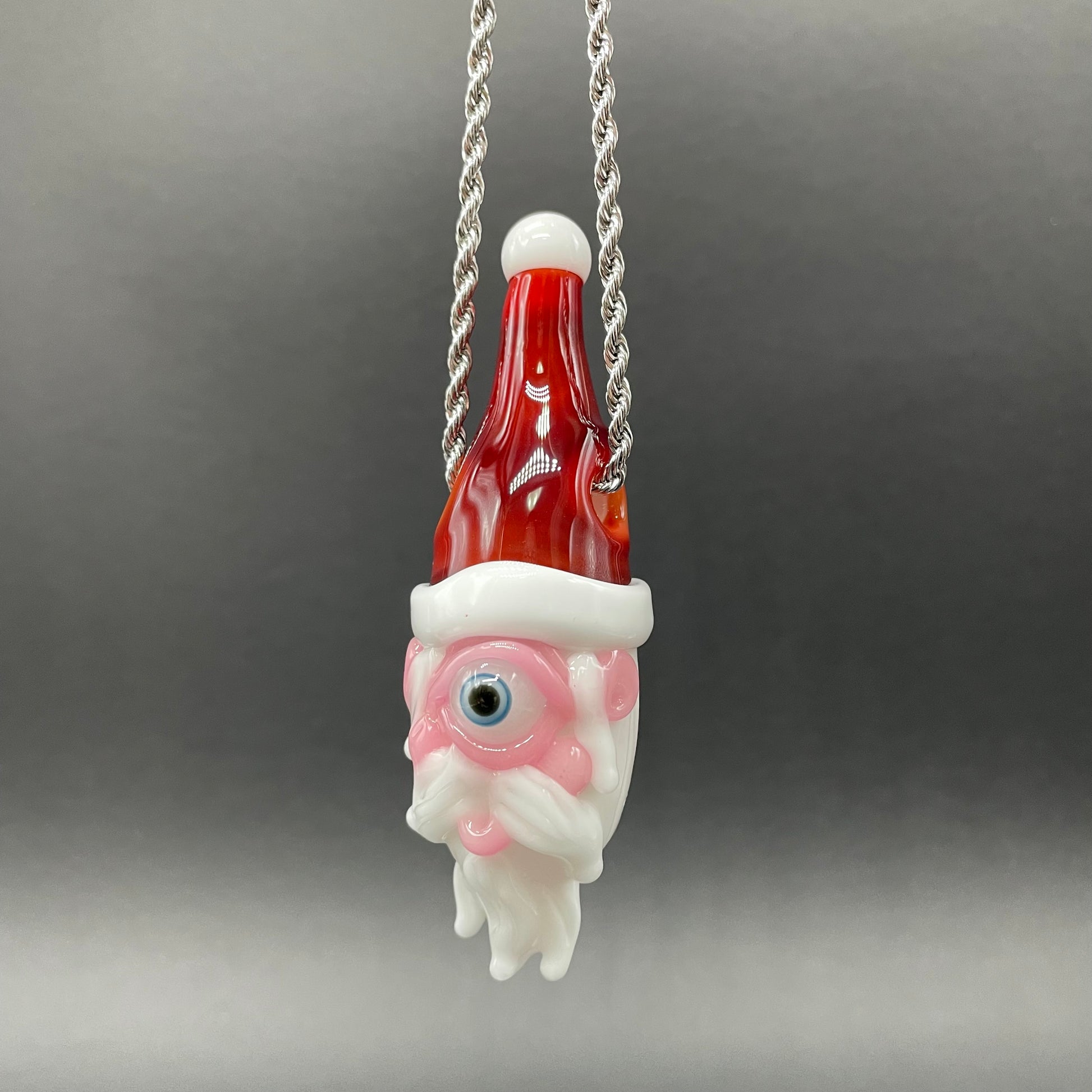 Hand-blown glass Cyclops Santa glass pendant by Leviathan Glass