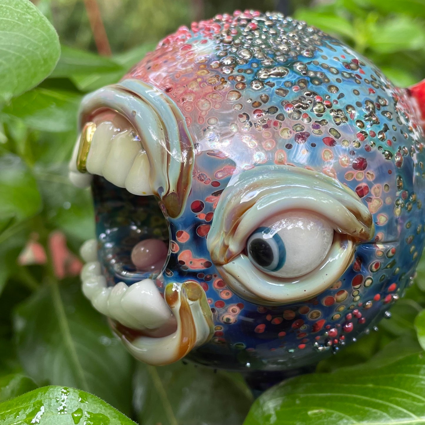 Hand blown glass monster watering globe