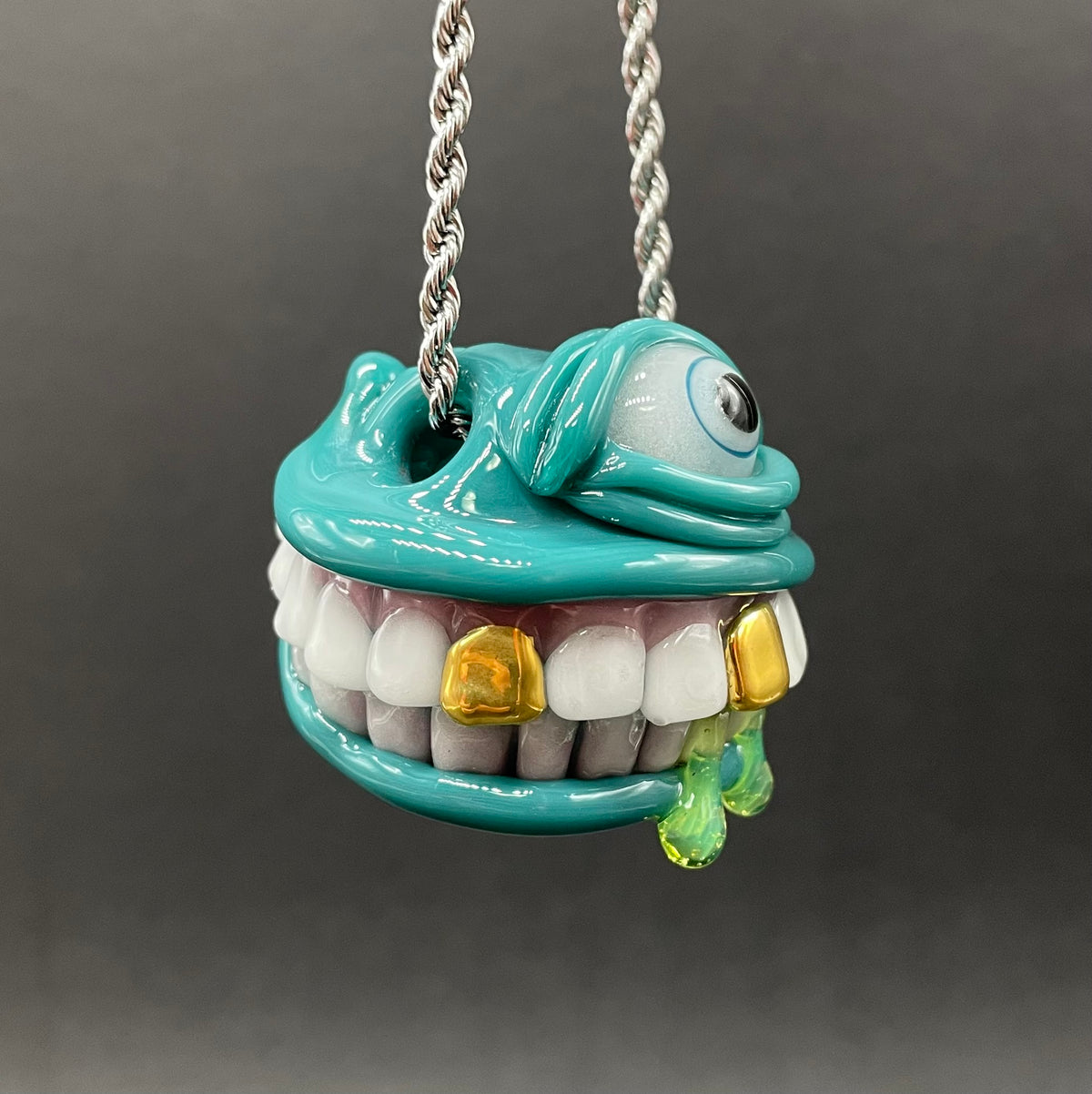 Grinning Like a Fool handblown glass pendant - oversized grinning monster face, white teeth, gold tooth, opal accents, silver rope chain - Leviathan Glass