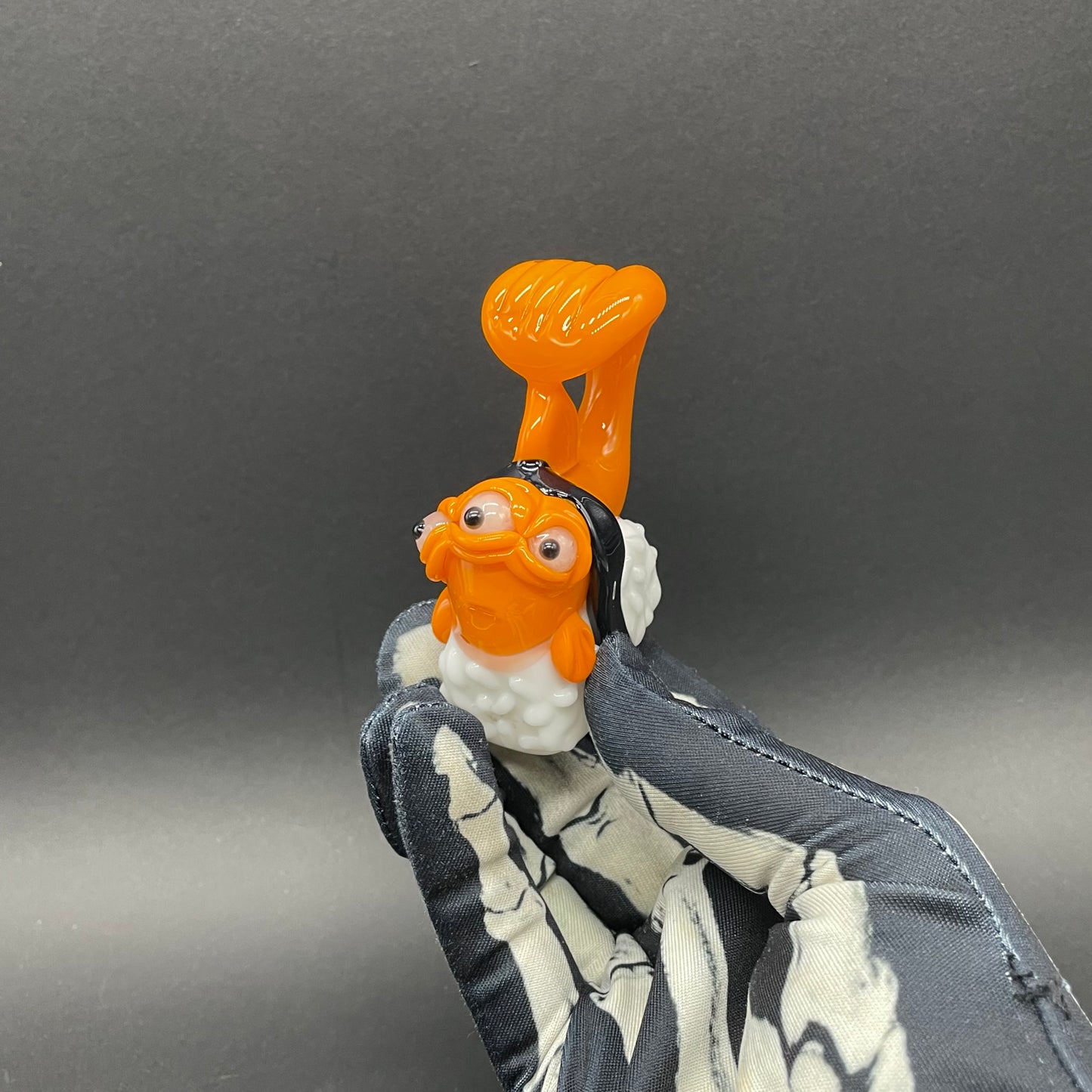 Mutant three eyed fish sushi glass pendant
