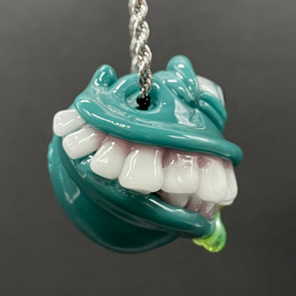 Grinning like a fool glass pendant