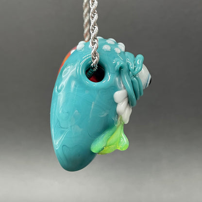 Two Headaches Are Better Than One handblown glass pendant - teal cyclops head with white teeth and green slime fused with red cyclops head with pink tongue, silver rope chain - Leviathan Glass