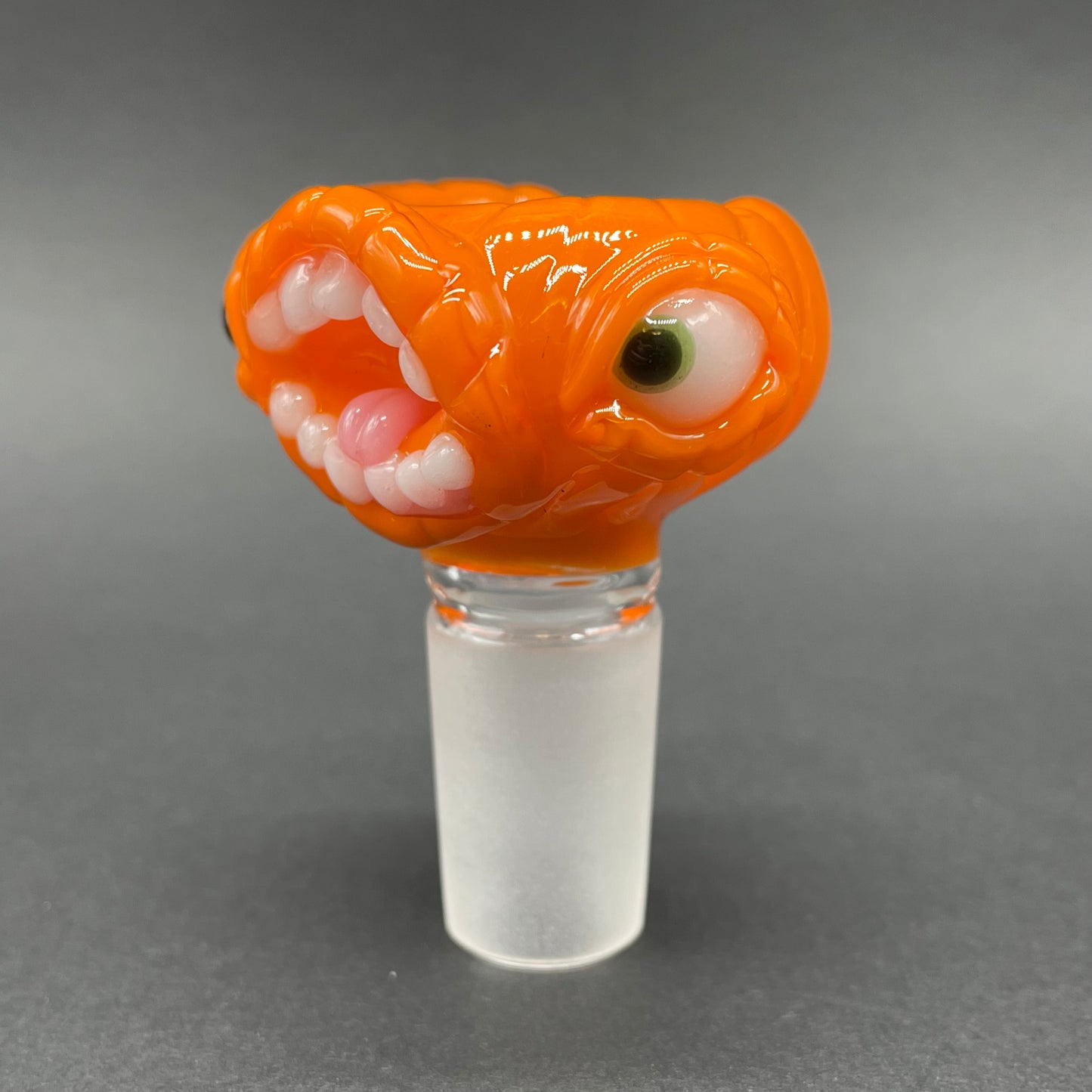 Close-up of 18mm Screaming pumpkin slide - handcrafted glass