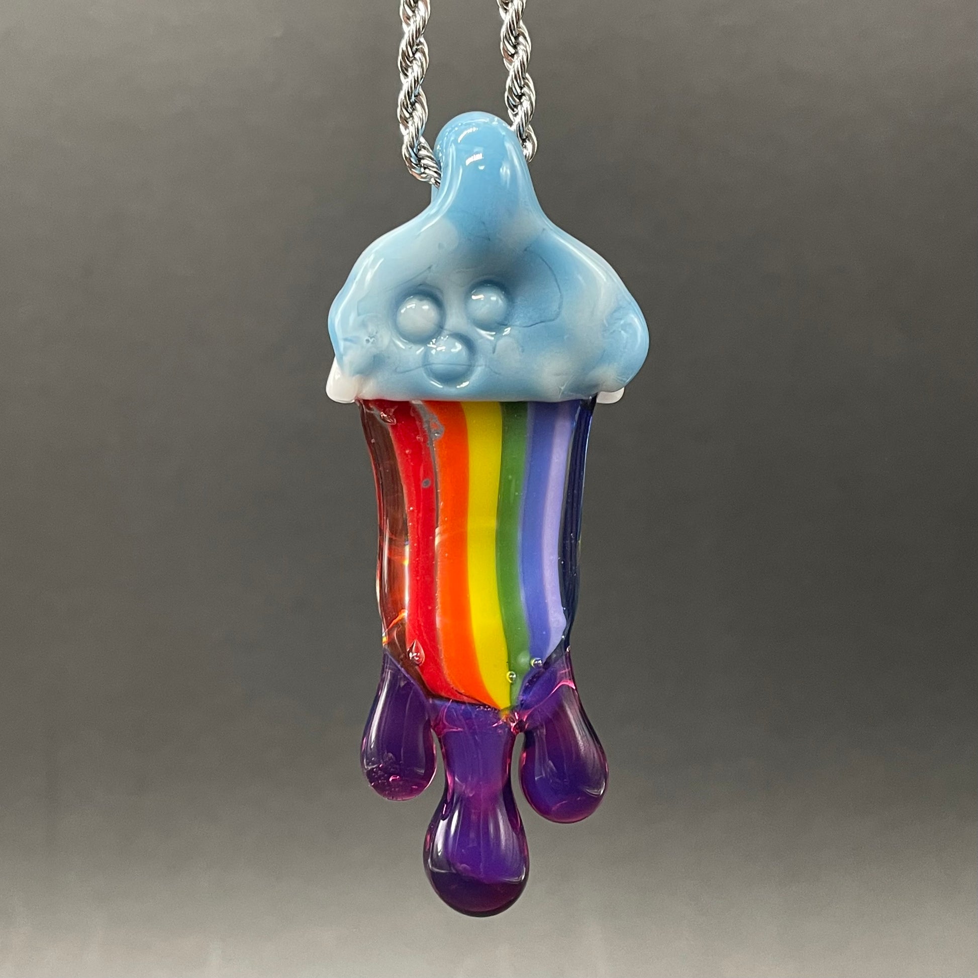 Glass opal rainbow tongue pendant by Leviathan Glass - artisan detail