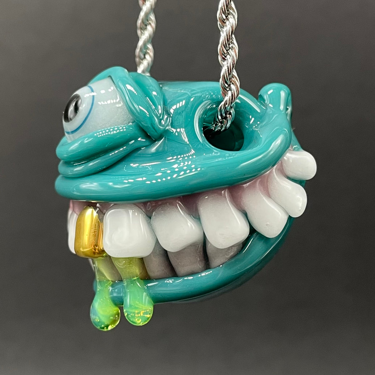 Grinning Like a Fool handblown glass pendant - oversized grinning monster face, white teeth, gold tooth, opal accents, silver rope chain - Leviathan Glass