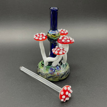 Close-up of Red cap Mushroom perfume bottle - handcrafted glass