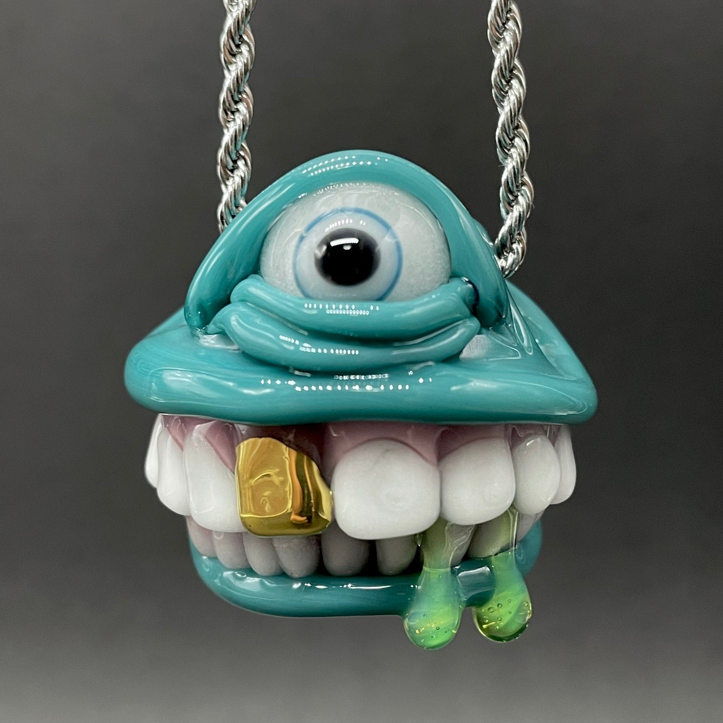 Grinning like a fool glass pendant