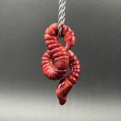 Hand-blown glass glass earthworm pendant by Leviathan Glass