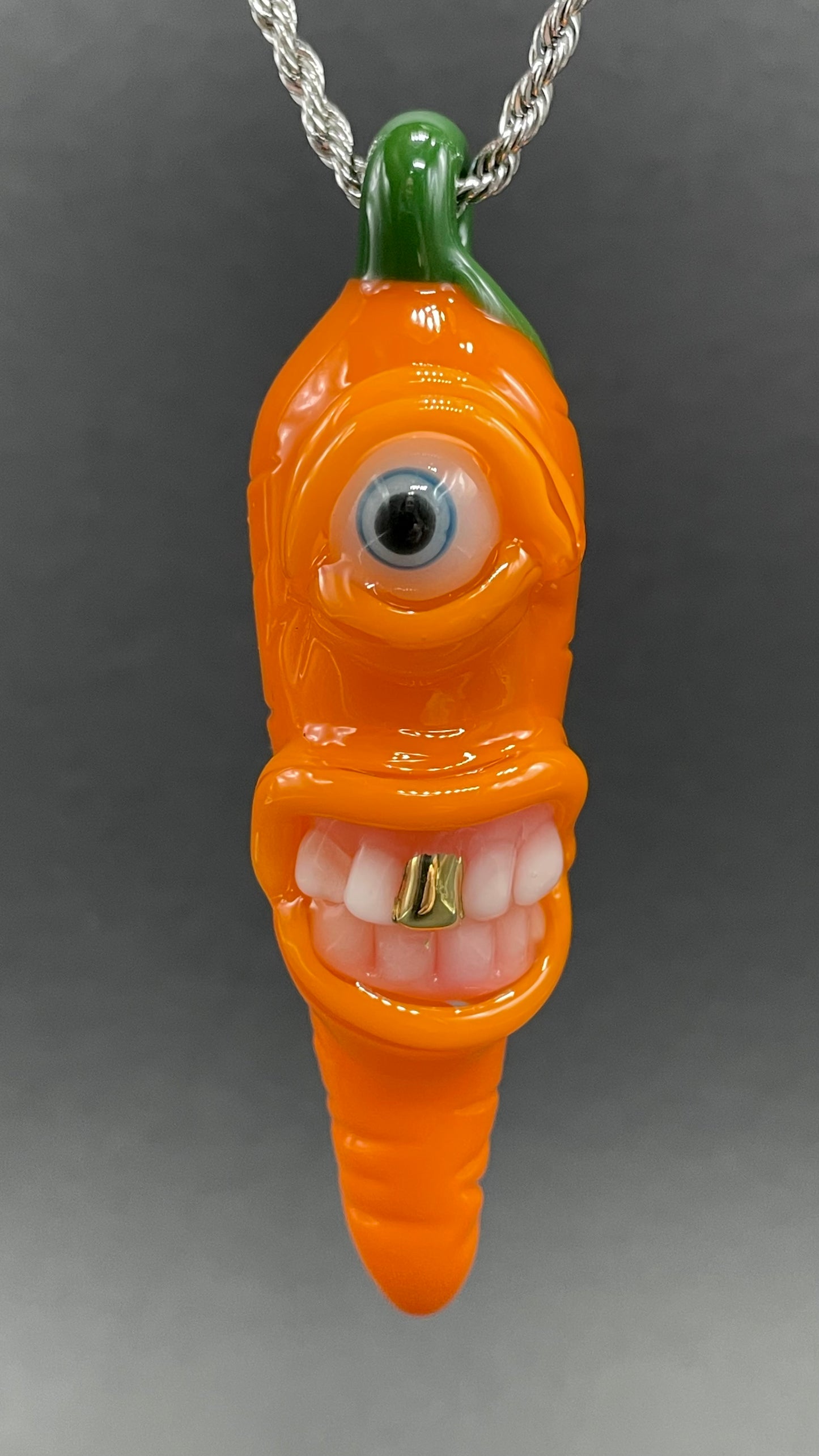 Glass carrot pendant detail view - premium glass art
