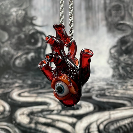 Hand-blown glass Anatomical cyclops heart pendant by Leviathan Glass