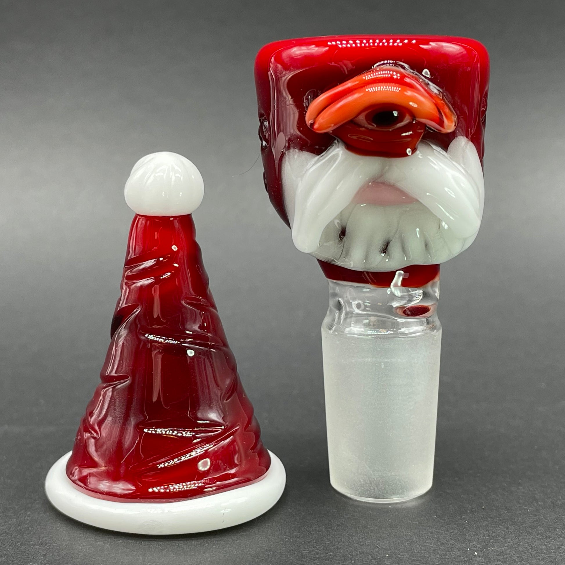 Close-up of 18mm Cyclopean Santa slide - handcrafted glass