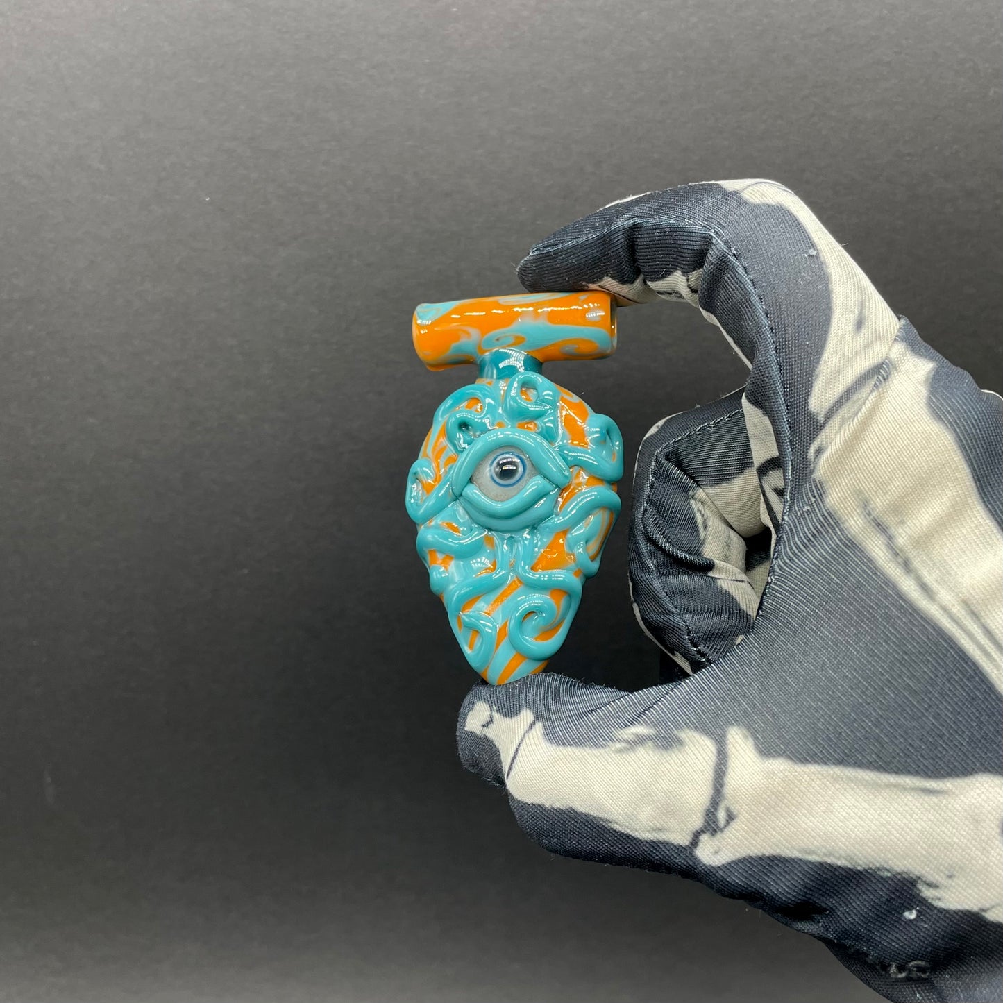 Close-up of Oculus tentacle pendant - handcrafted glass