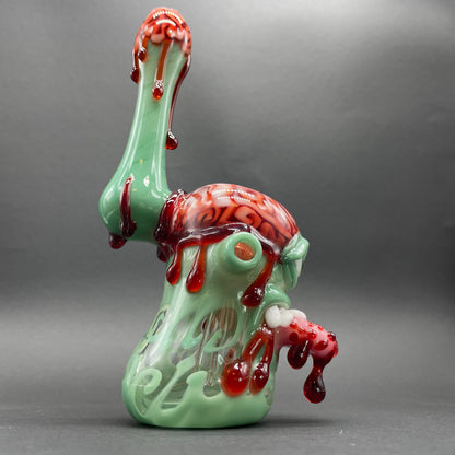 Close-up of Brain eater bubbler - handcrafted glass