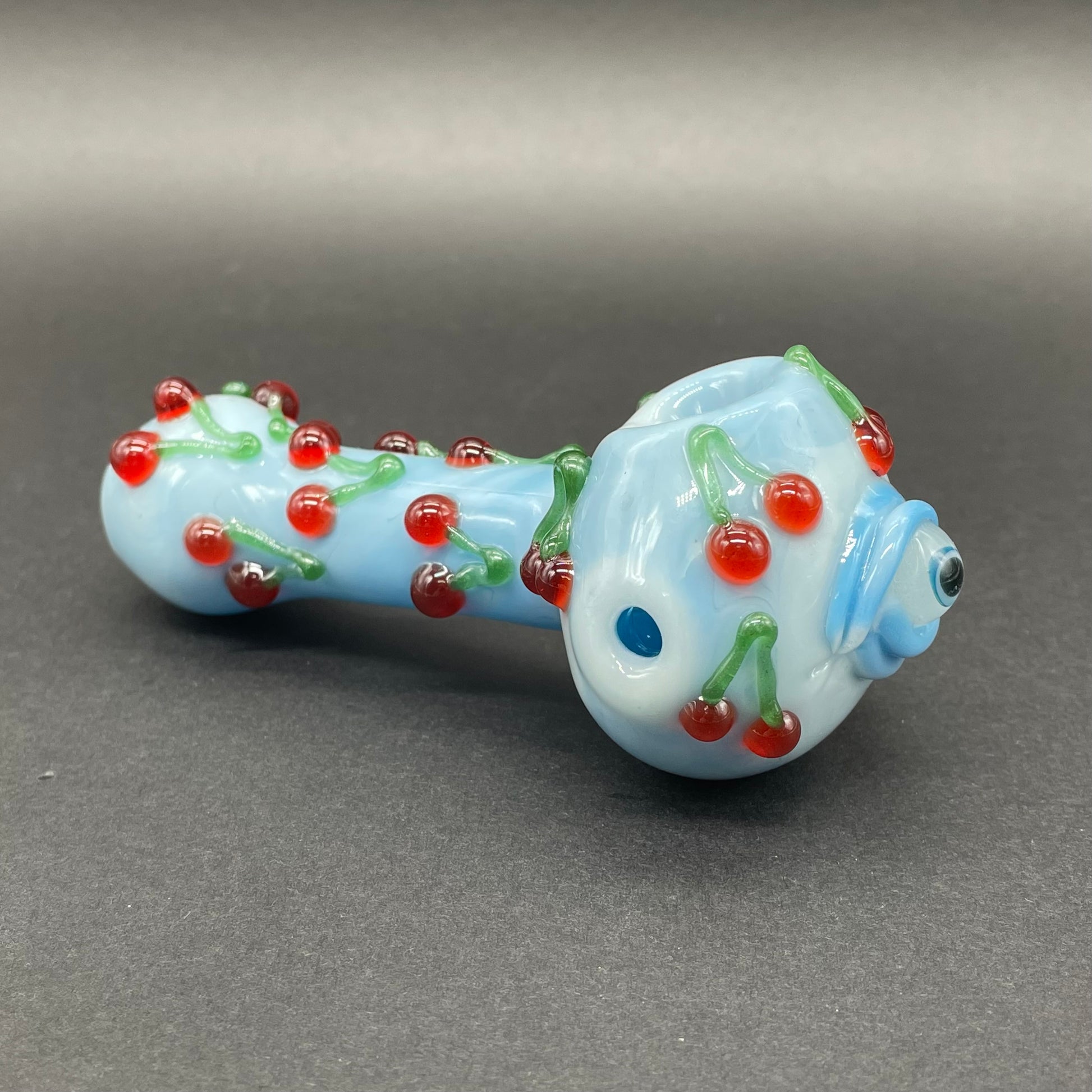 Cherry bomb spoon detail view - premium glass art