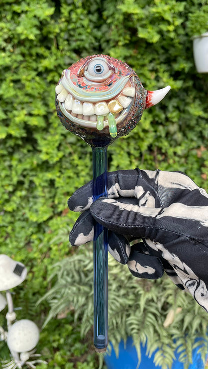 Hand blown glass monster watering globe