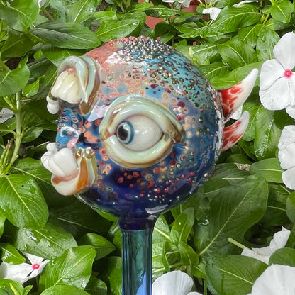 Hand blown glass monster watering globe
