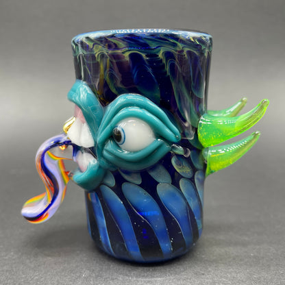 Hand blown kool AID tongue shot glass with gold tooth by Leviathan Glass - artisan detail